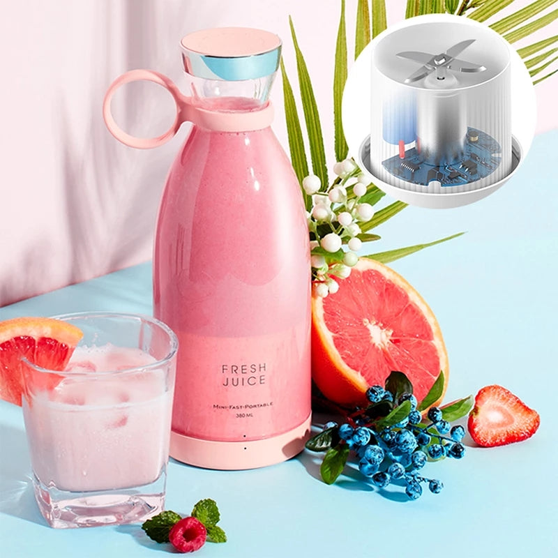 Pink 'Fresh Juice' water bottle with a glass of pink drink, fruit slices, and a small fan on a light blue background.
